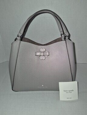 Kate Spade Talia Small Triple Compartment Satchel in a soft taupe.